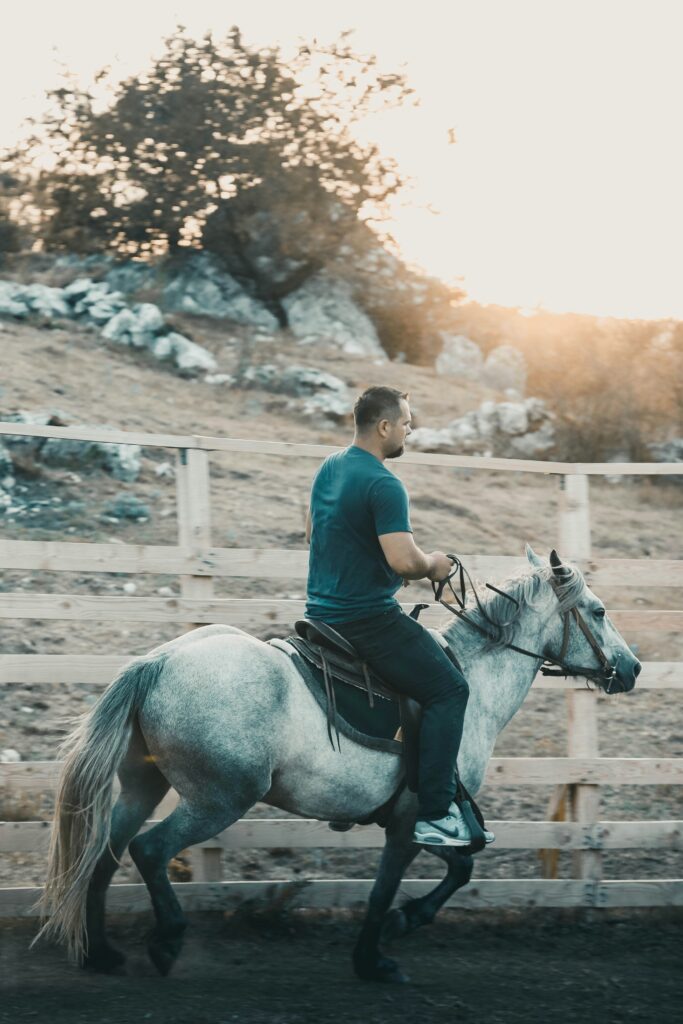man on white horse